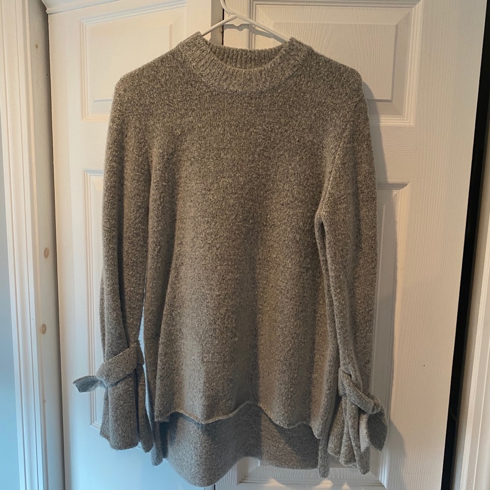 Tunic sweater with bow sleeve detail